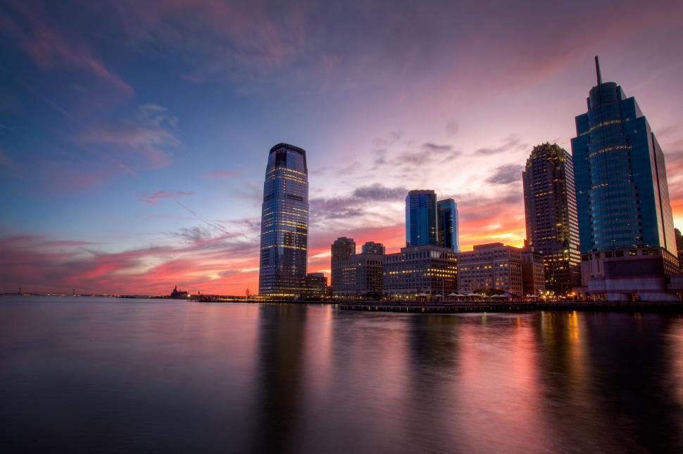 Free Stock Photo of Stunning skyline at sunset with reflections ...