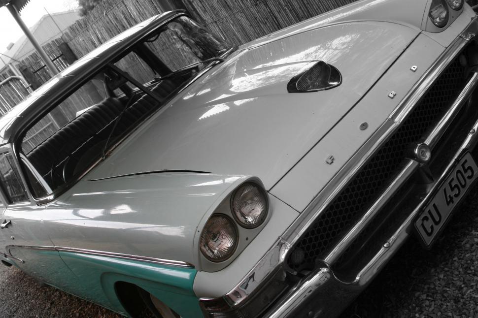 Free Image of Old Car Parked on Side of Road 