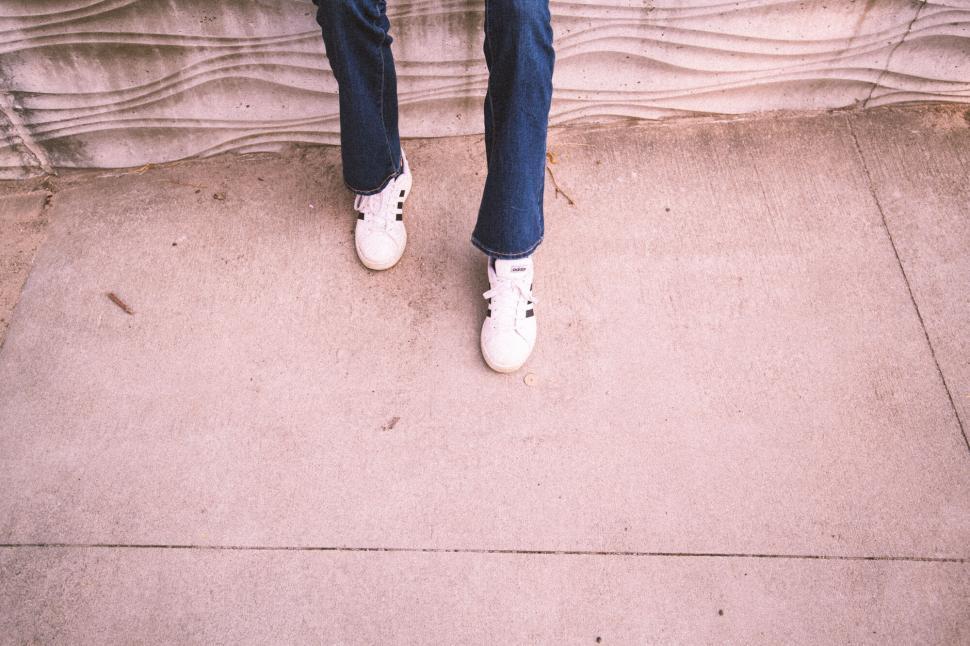 Free Image of Vintage sneakers on weathered concrete stairs 
