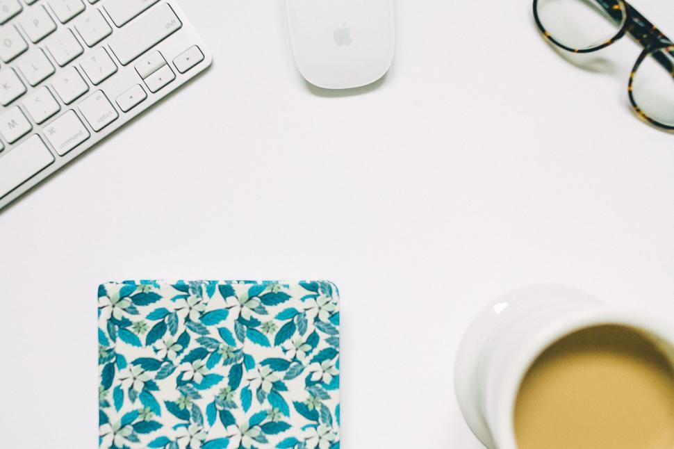 Free Image of Minimalist workspace with coffee and glasses 