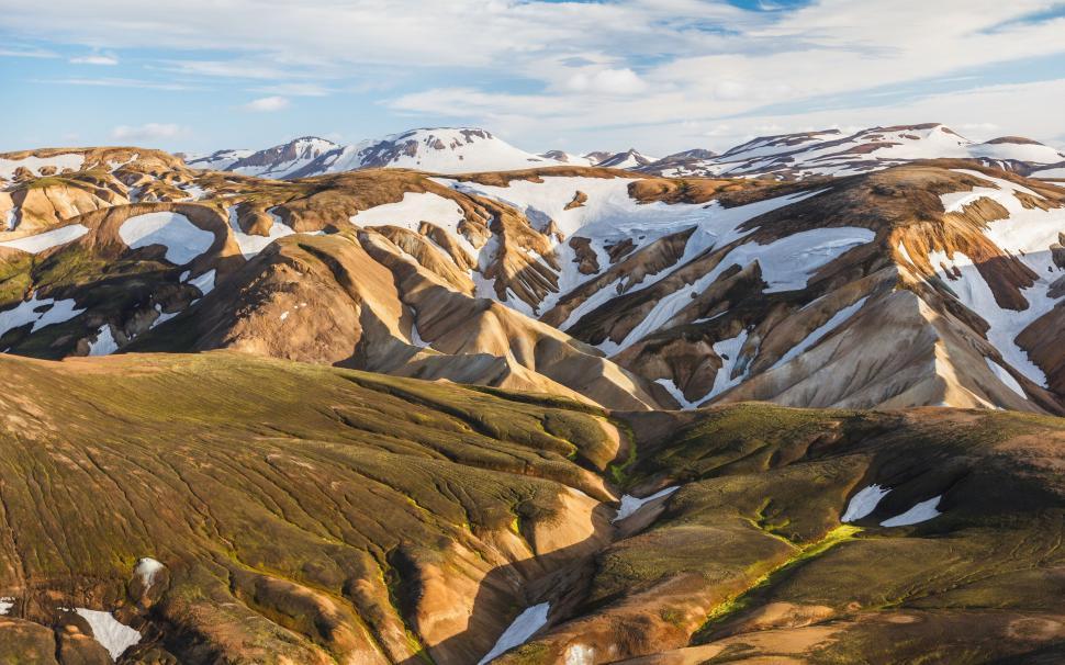 Free Image of Colorful mountain ridges with snow patches 