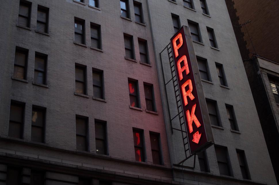 Free Image of Neon  PARK  sign on a building facade 