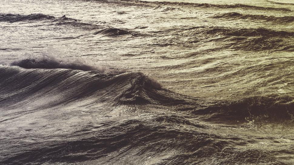 Free Image of Waves texture on golden sunset light 
