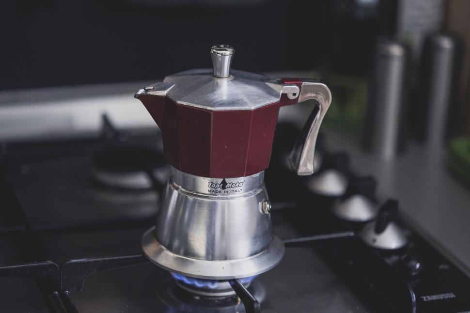 Free Image of Italian Moka pot brewing on gas stove 