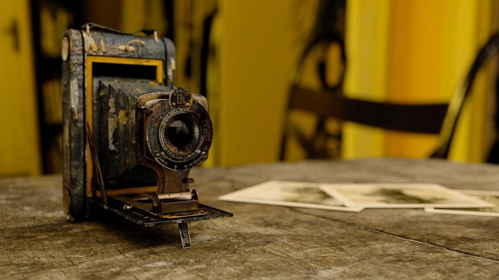 Free Image of Vintage Camera on Wooden Table 