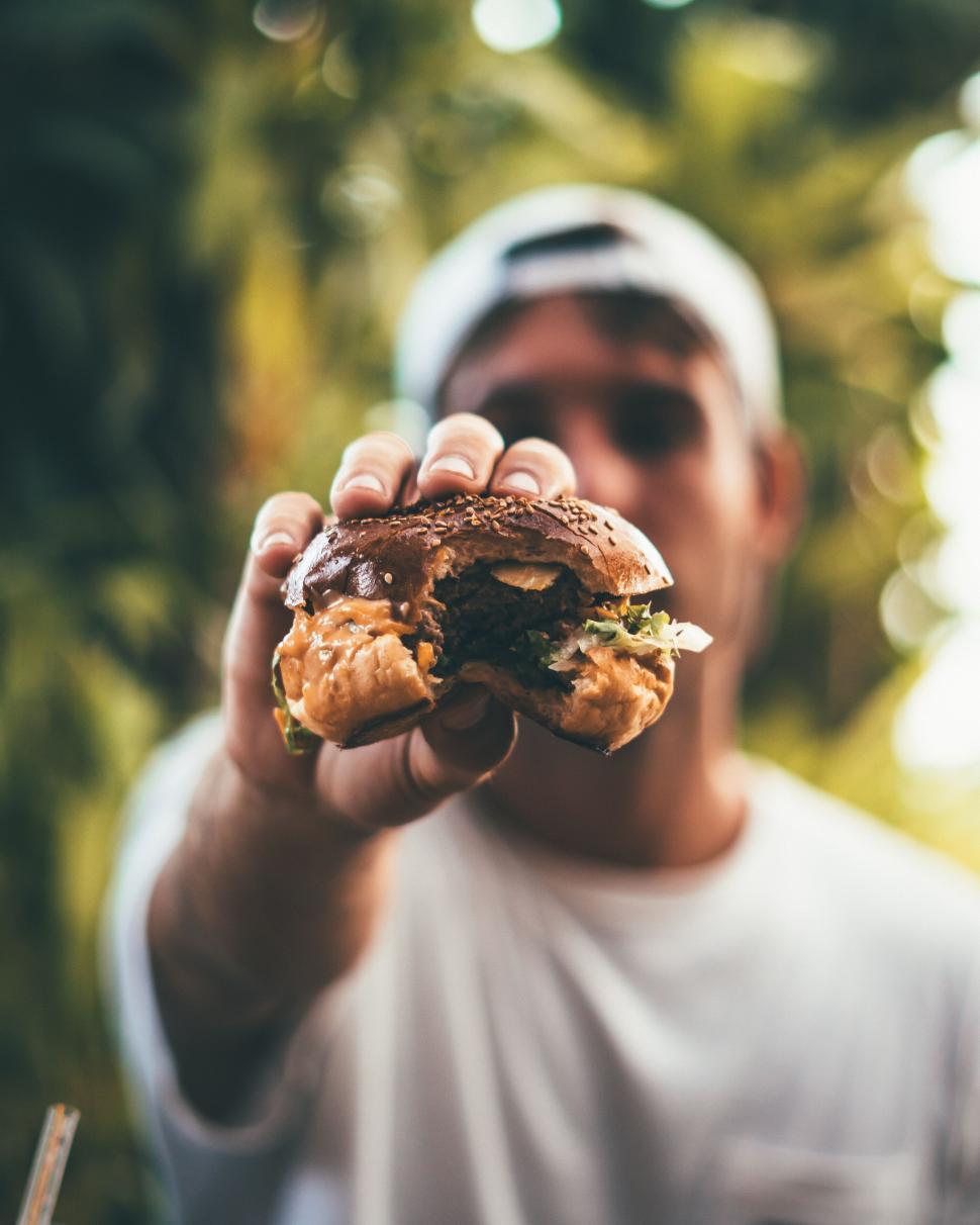 Free Image of Hand holding a delicious ice cream sandwich 