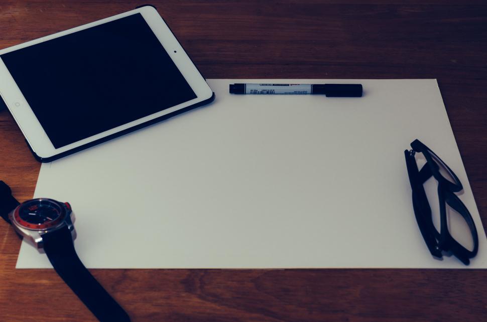 Free Image of Workspace with tablet and office supplies 