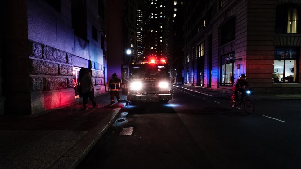 Free Image of Firetruck responding to an emergency in the city 