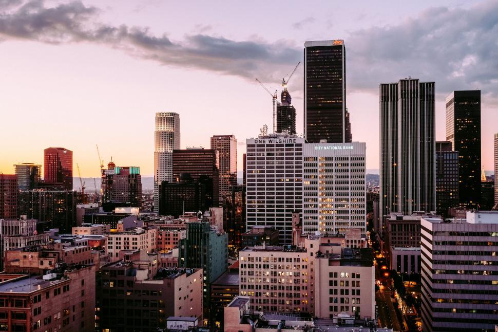 Free Image of Dusk over a vibrant city skyline 