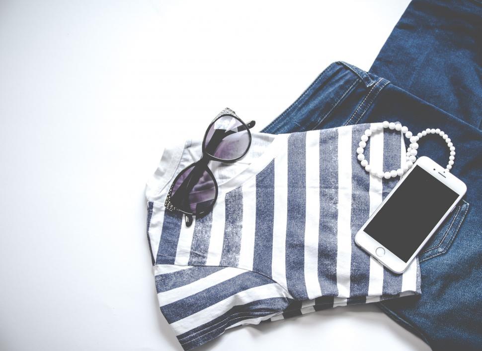 Free Image of Fashionable t-shirt and accessories with a smartphone 