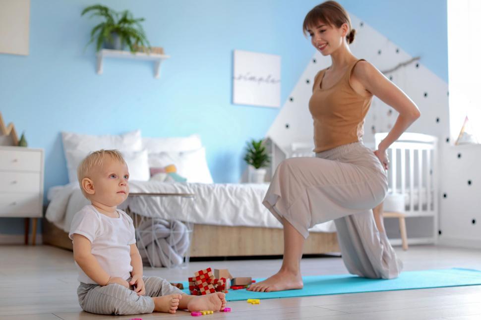 Free Image of Mother and baby having playful moment 