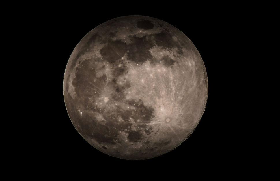 Free Image of Close-up photo of the full moon in night sky 