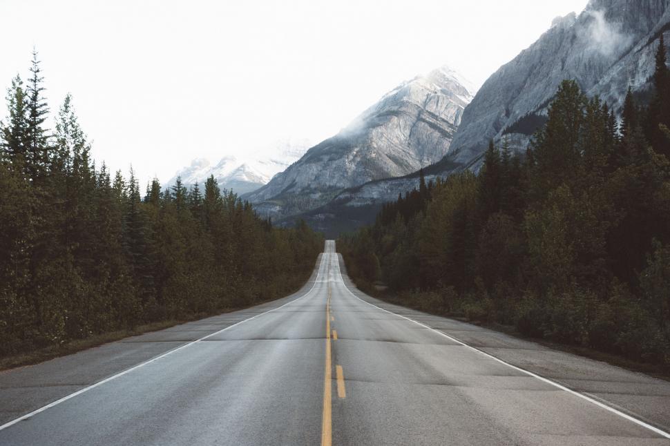 Free Image of Road stretching into mountainous horizon 