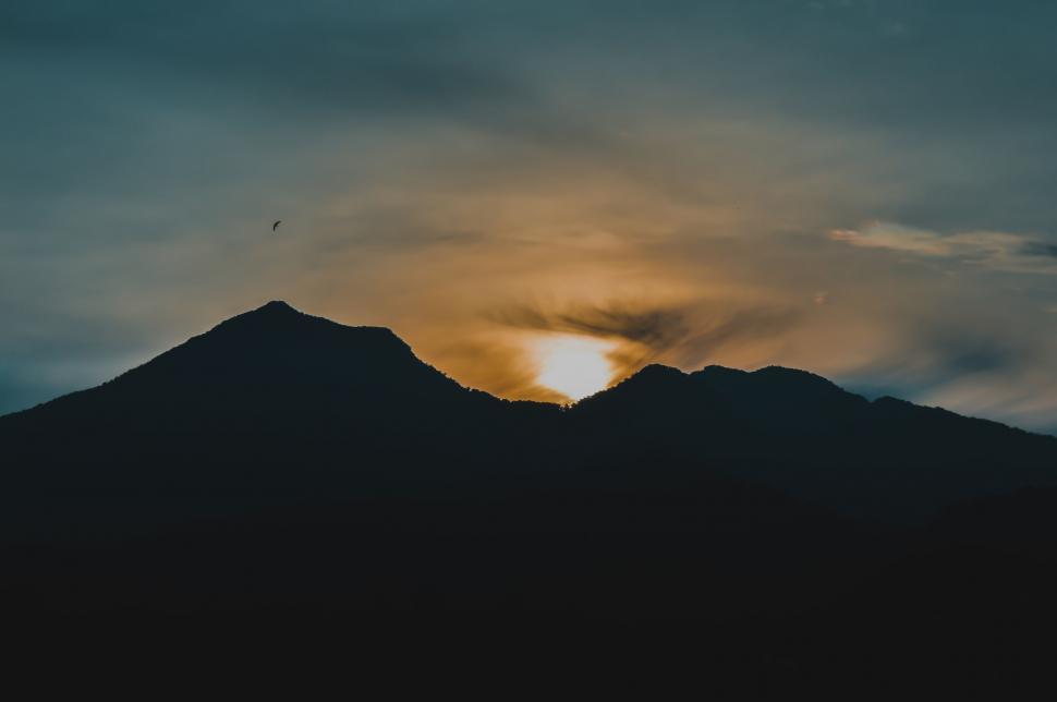 Free Image of Silhouette of mountains against sunset sky 