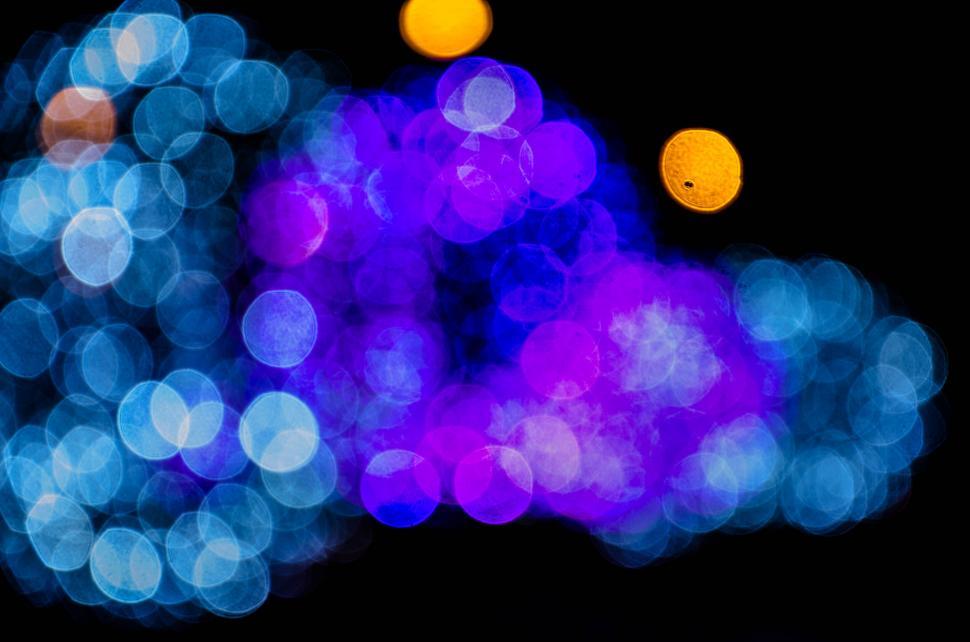 Free Image of Abstract blue and purple bokeh lights 