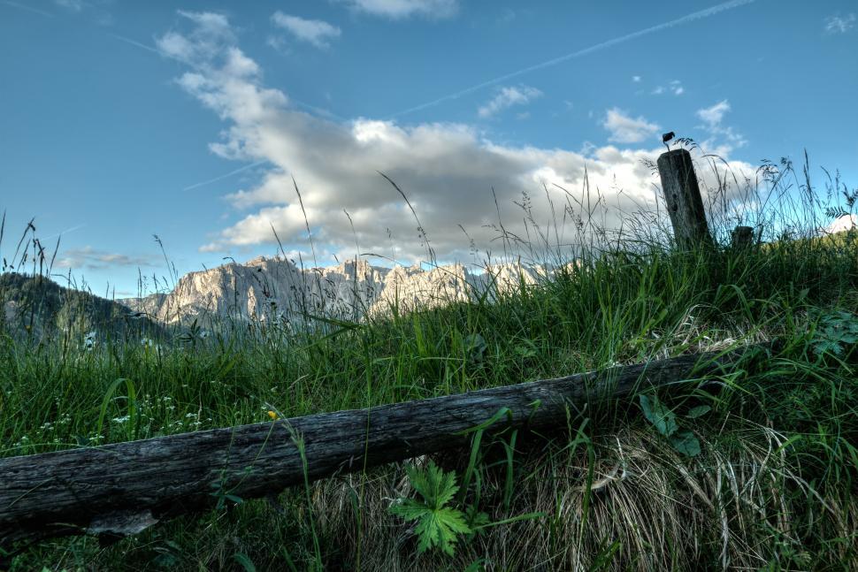 Free Image of Mountain landscape with wooden fence and grass 