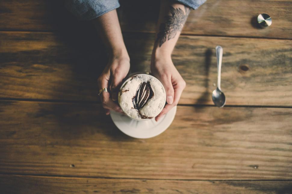 Free Image of Top view of a dessert held by hands 