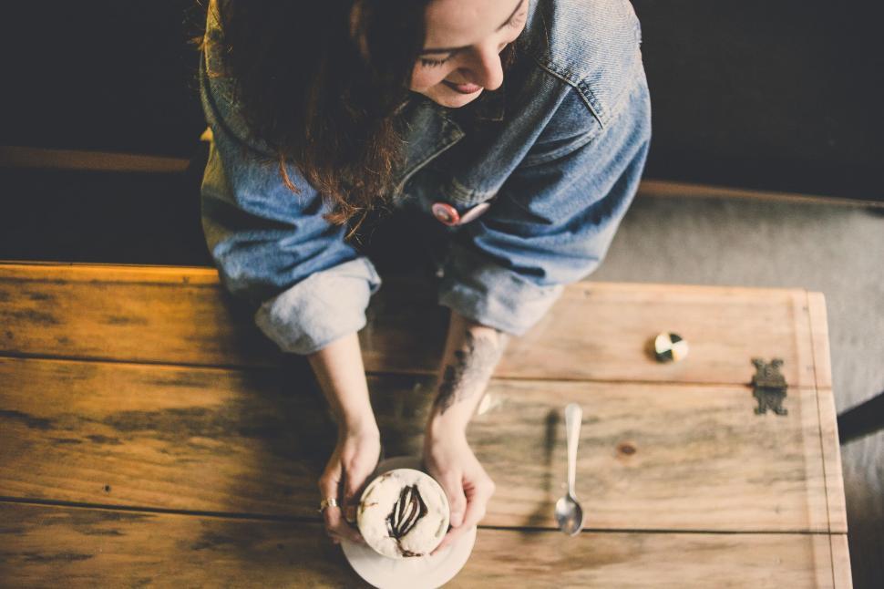 Free Image of Rear view of person eating dessert 