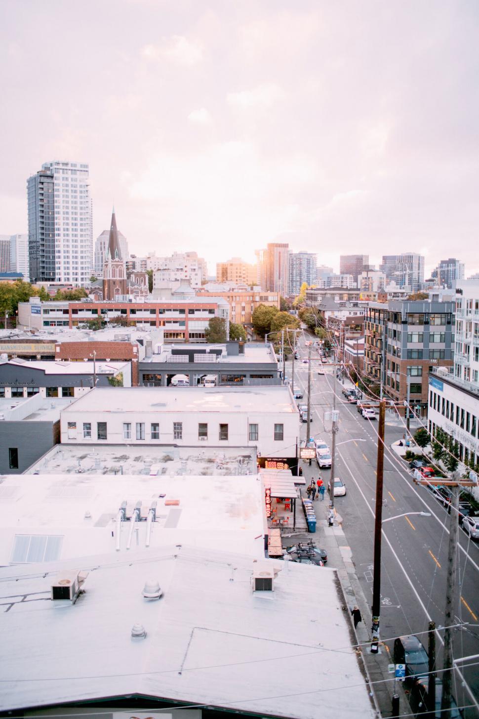 Free Image of Cityscape at sunset with urban buildings 