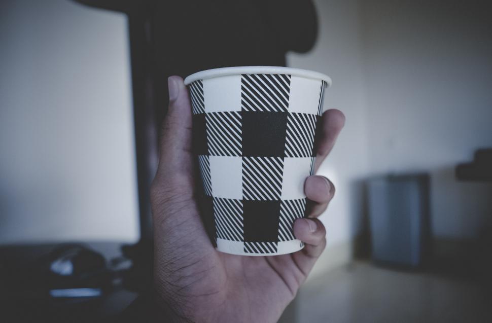 Free Stock Photo of Hand holding a patterned paper cup | Download Free ...