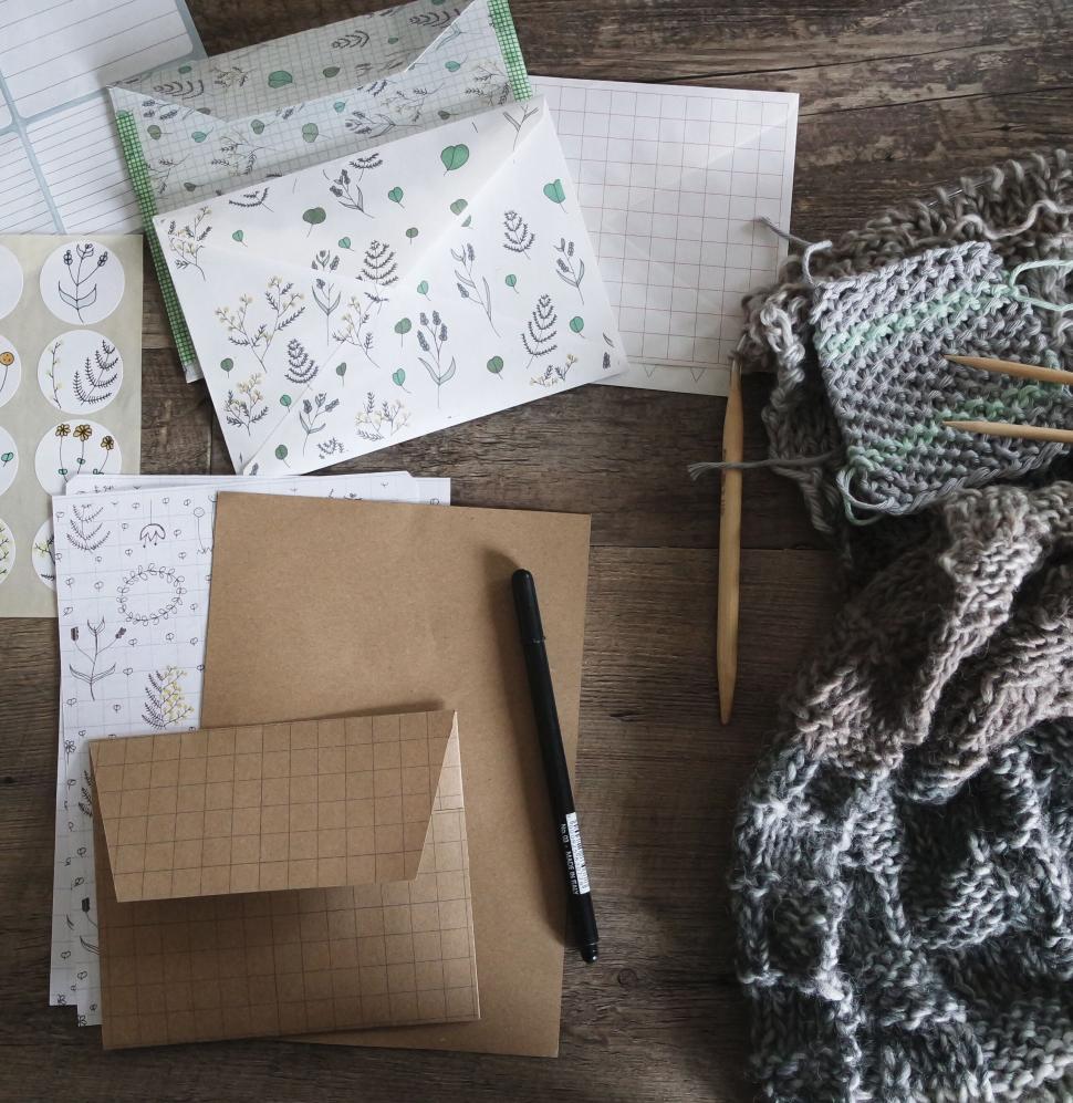 Free Image of Knitting project and design materials on wood 