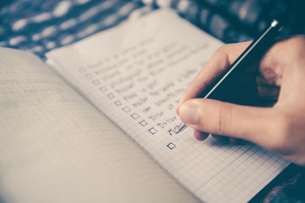 Free Image of Handwriting checklist in a notebook 