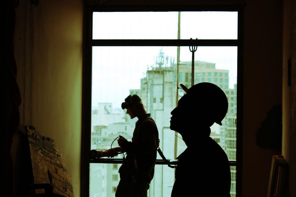 Free Image of Silhouettes in front of window backlight 