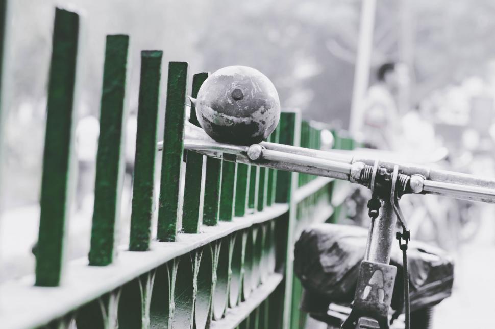 Free Image of Vintage bicycle by fence in grayscale 