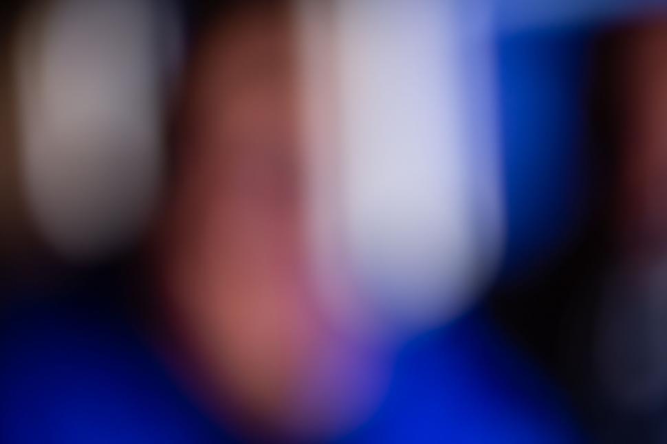 Free Image of Abstract blue and white blurred lights 