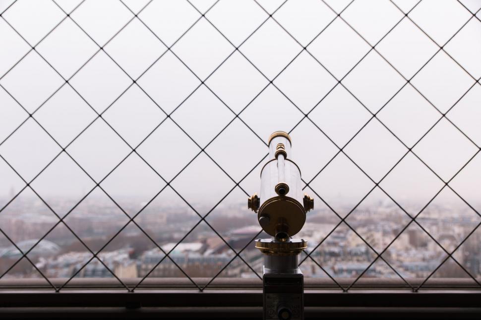 Free Image of Telescope overlooking an urban landscape 