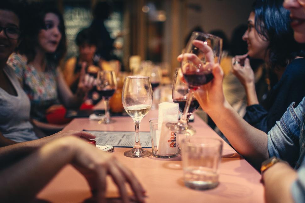 Free Image of Friends enjoying wine at a social gathering 