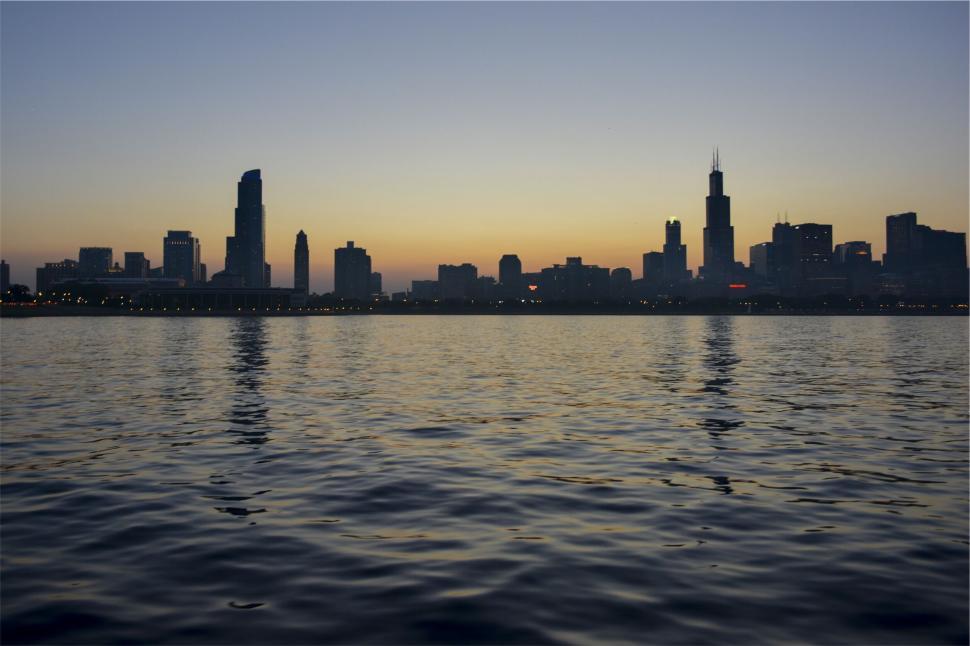 Free Image of City skyline silhouette during sunset 