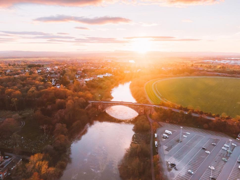 Free Image of Aerial view of sunrise over landscape 