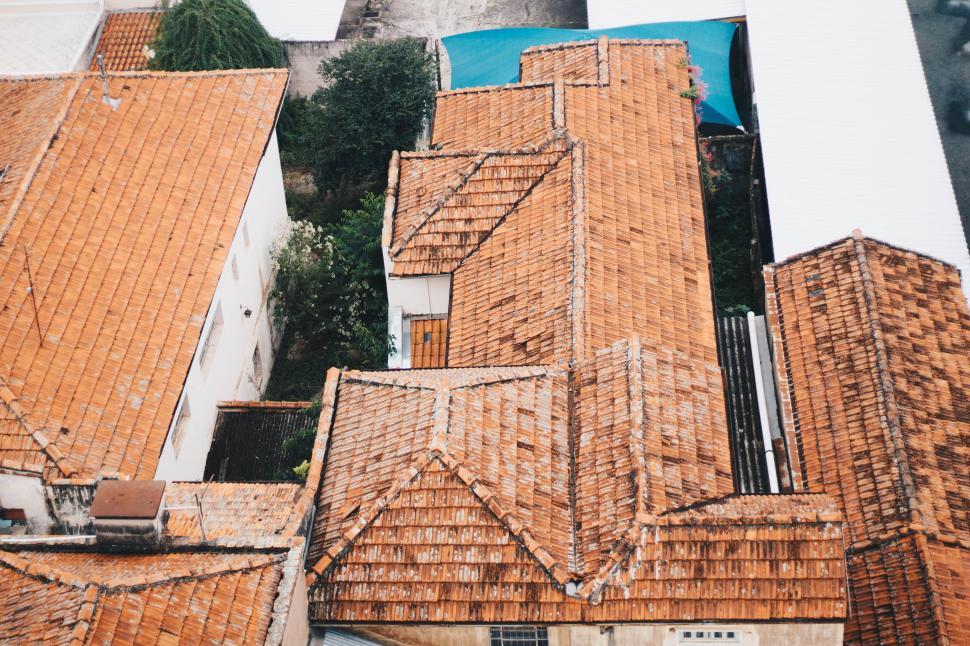 Free Image of Aerial view of terracotta tiled rooftops 