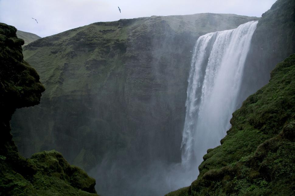 Free Image of Majestic waterfall in a green landscape 