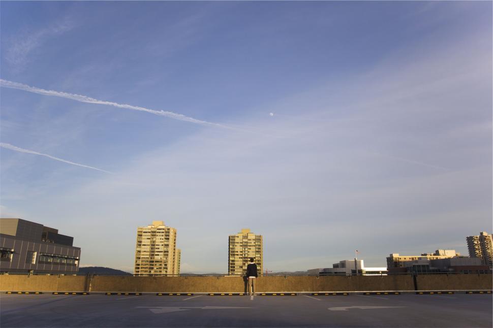 Free Stock Photo of Solitary figure on urban rooftop | Download Free ...