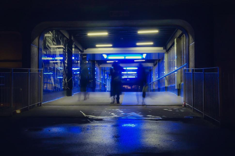 Free Image of Blurred figure in illuminated tunnel 