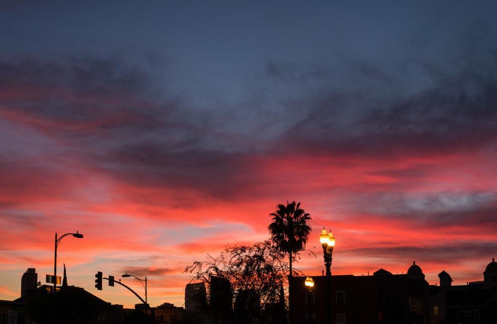 Free Image of Colorful sunset over urban skyline 