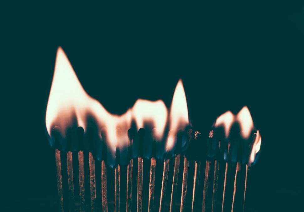 Free Image of Matches igniting in the dark 