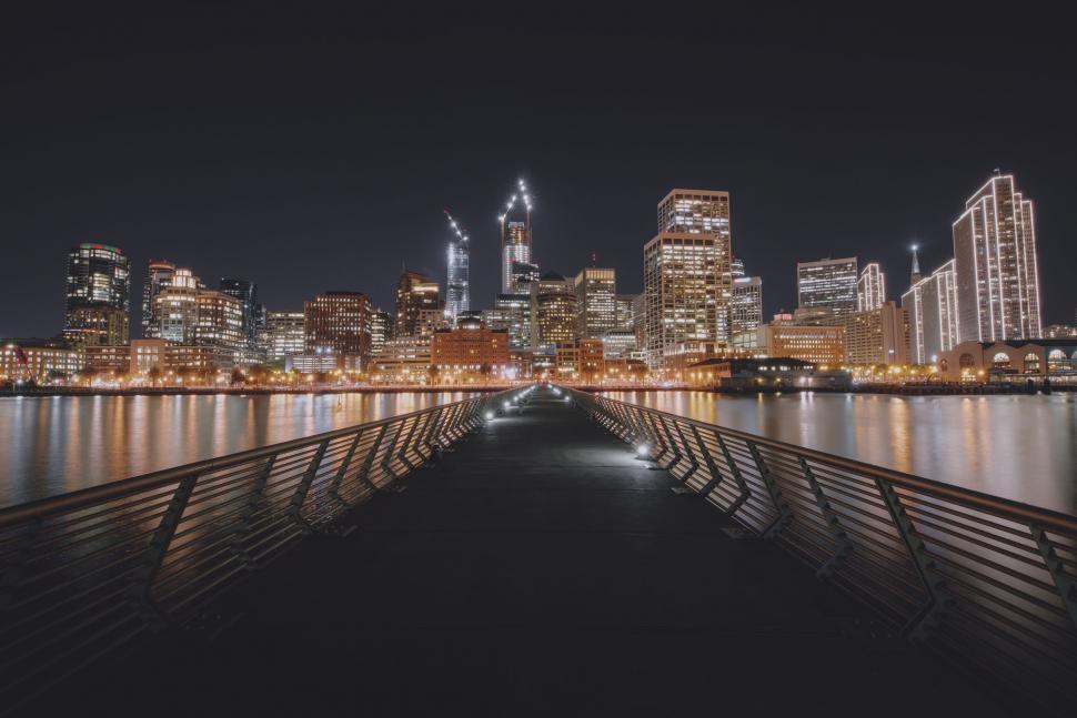 Free Image of Night city view from an empty pier 