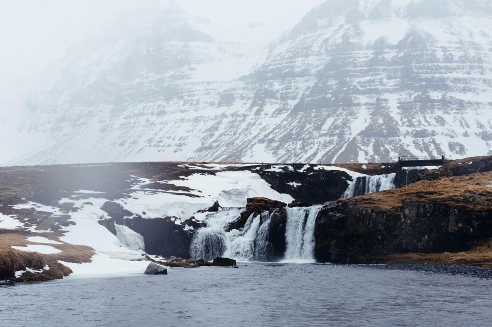 Free Image of Snowy waterfall landscape in highlands 