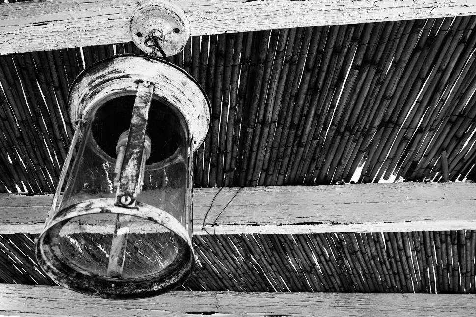 Free Stock Photo of Vintage hanging lantern against a straw roof ...