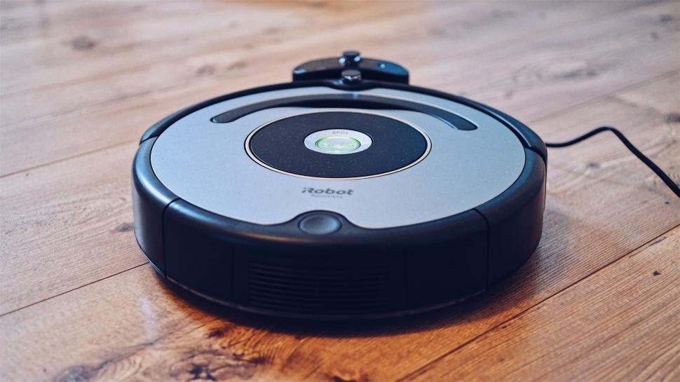 Free Stock Photo of Robotic vacuum cleaner on wooden floor | Download Free Images and Free Illustrations