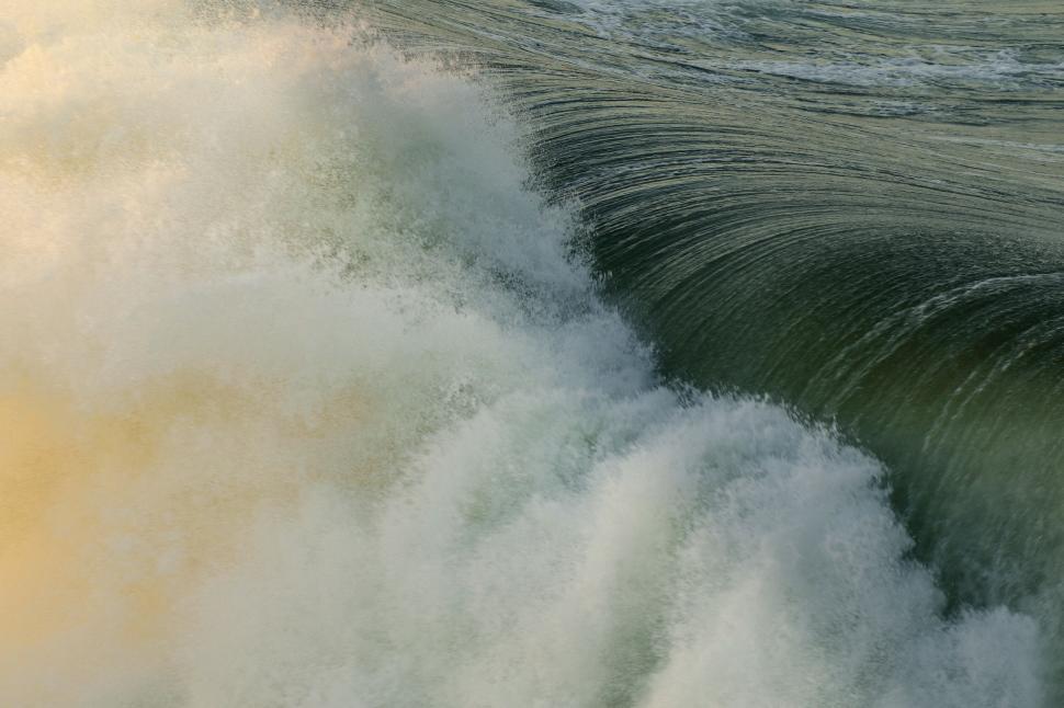 Free Image of Crashing ocean wave close-up view 