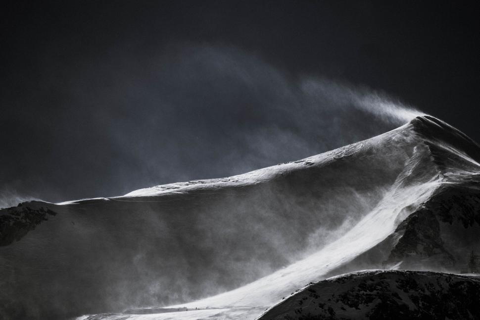 Free Image of Monochrome snowy mountain with wind 