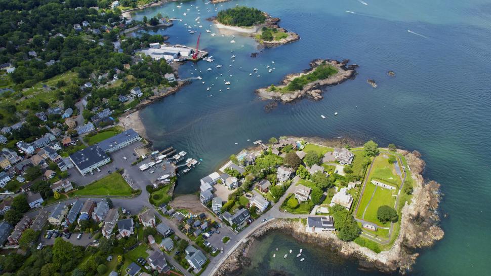 Free Image of Aerial view of coastal town and waters 