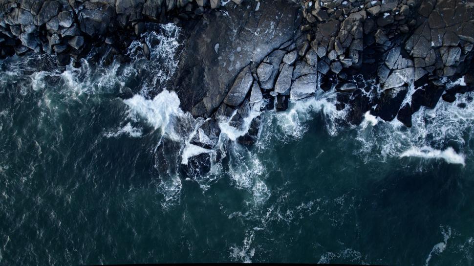 Free Stock Photo of Rocky coastline with crashing waves aerial ...