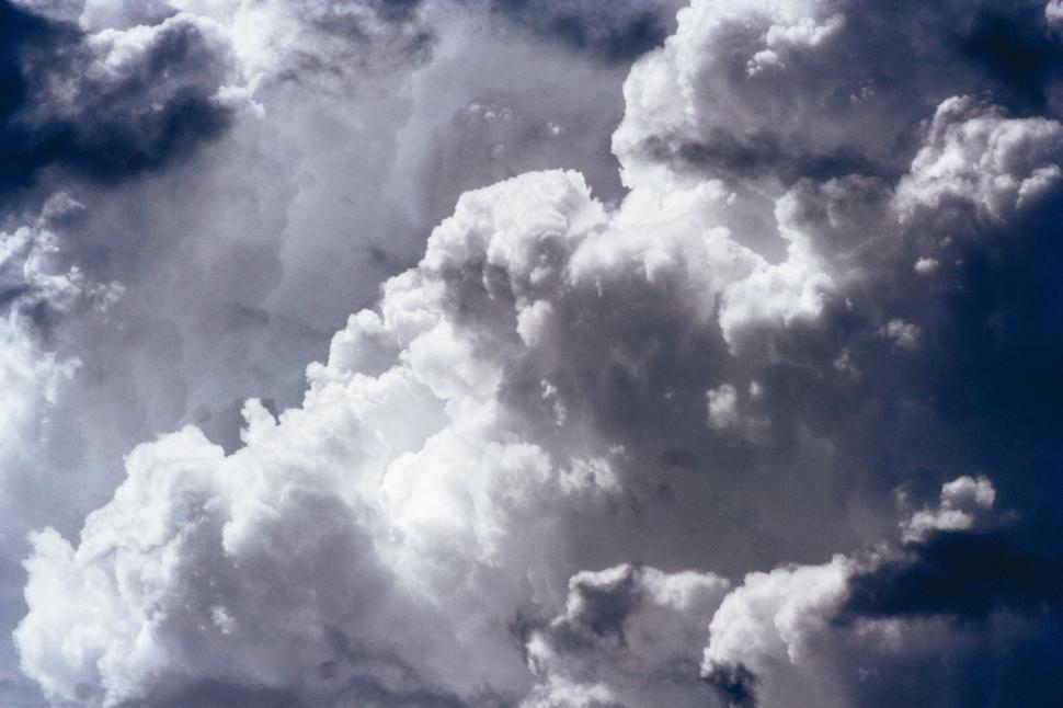 Free Image of Cumulus clouds in a stormy sky 