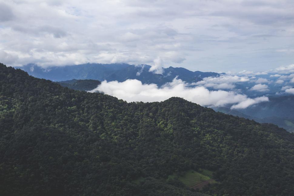 Free Image of Misty Mountain Landscape with Clouds 