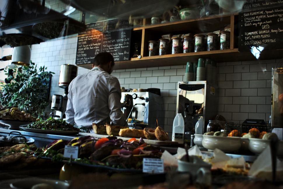 Free Image of Chef preparing food in modern stylish restaurant kitchen 